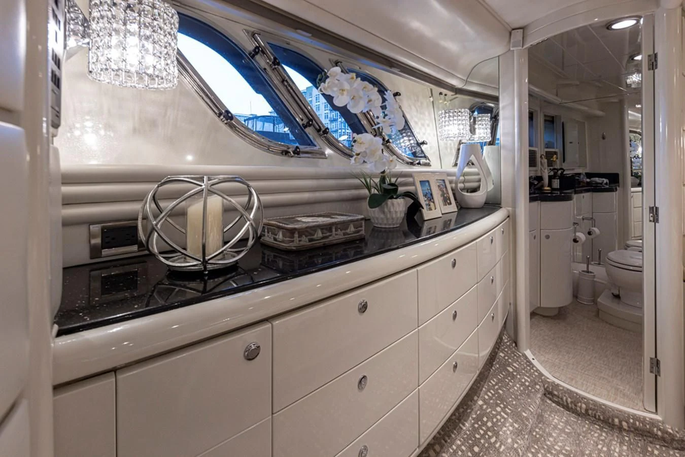a bathroom with a large window aboard UNDAUNTED Yacht for Sale