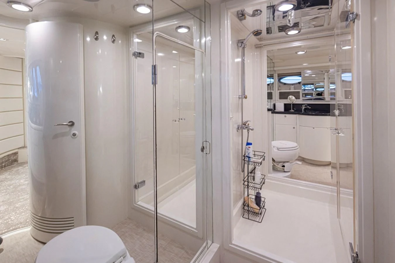 a bathroom with a glass shower aboard UNDAUNTED Yacht for Sale