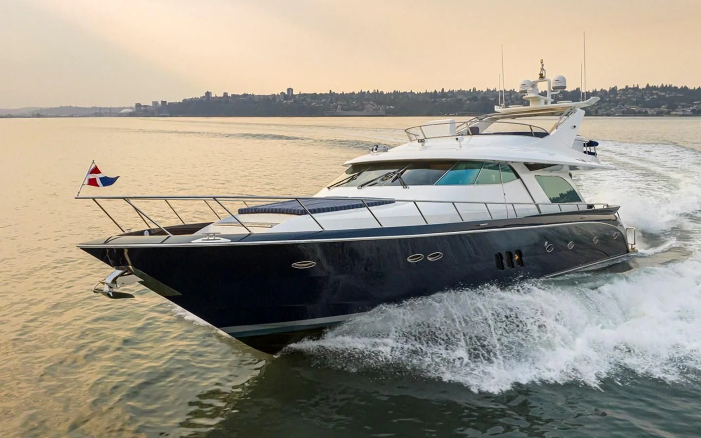 a boat splashing in water aboard UNDAUNTED Yacht for Sale