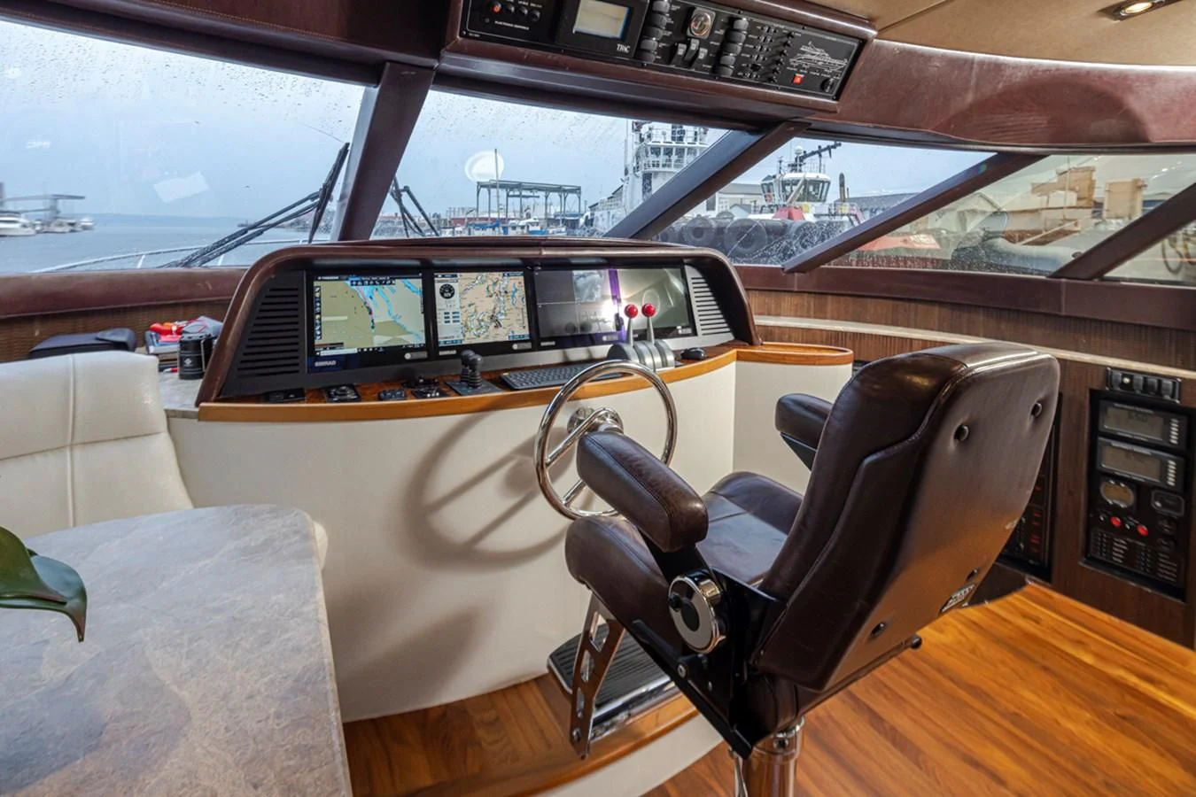 a car with a large windshield aboard UNDAUNTED Yacht for Sale