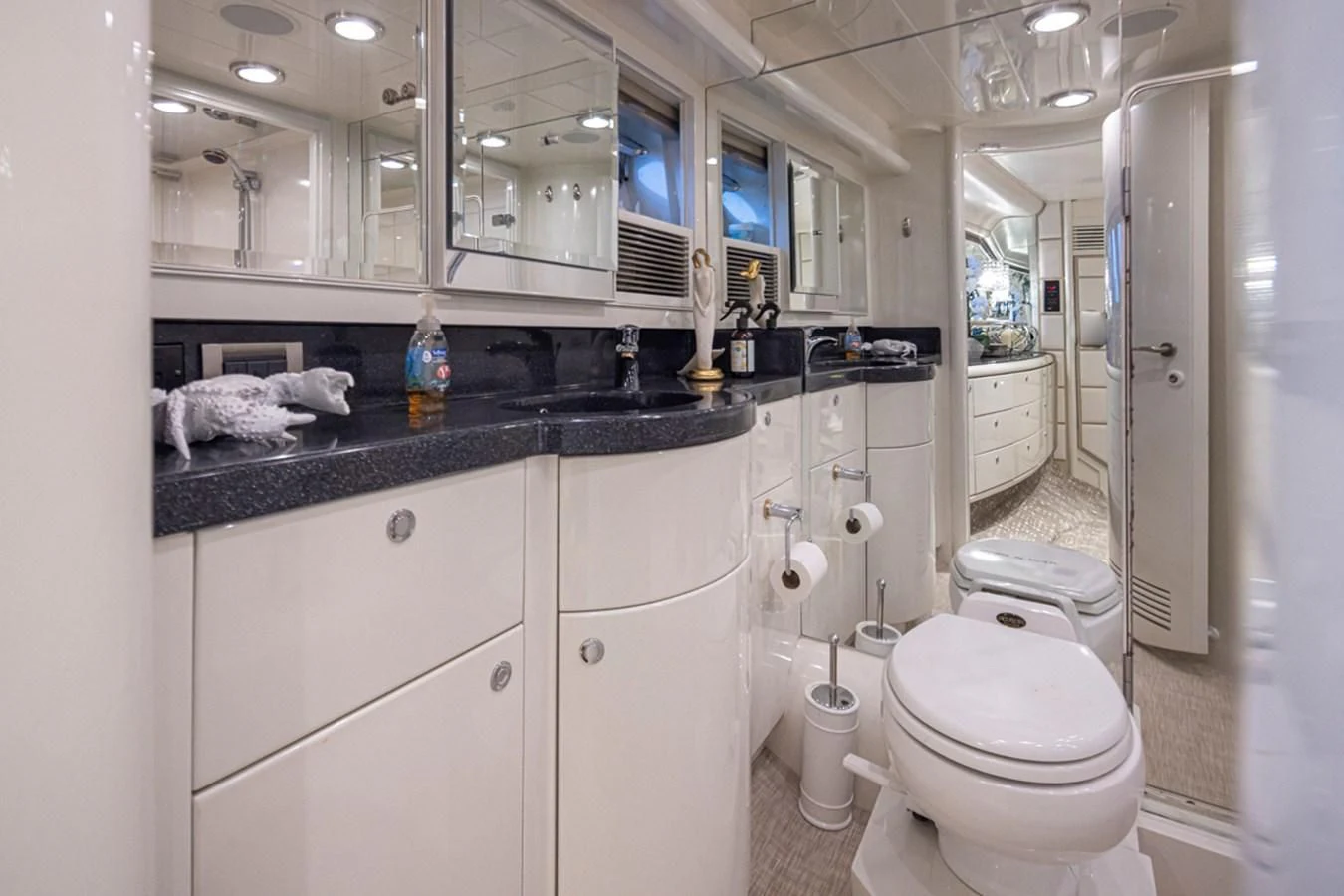 a bathroom with a sink and a toilet aboard UNDAUNTED Yacht for Sale