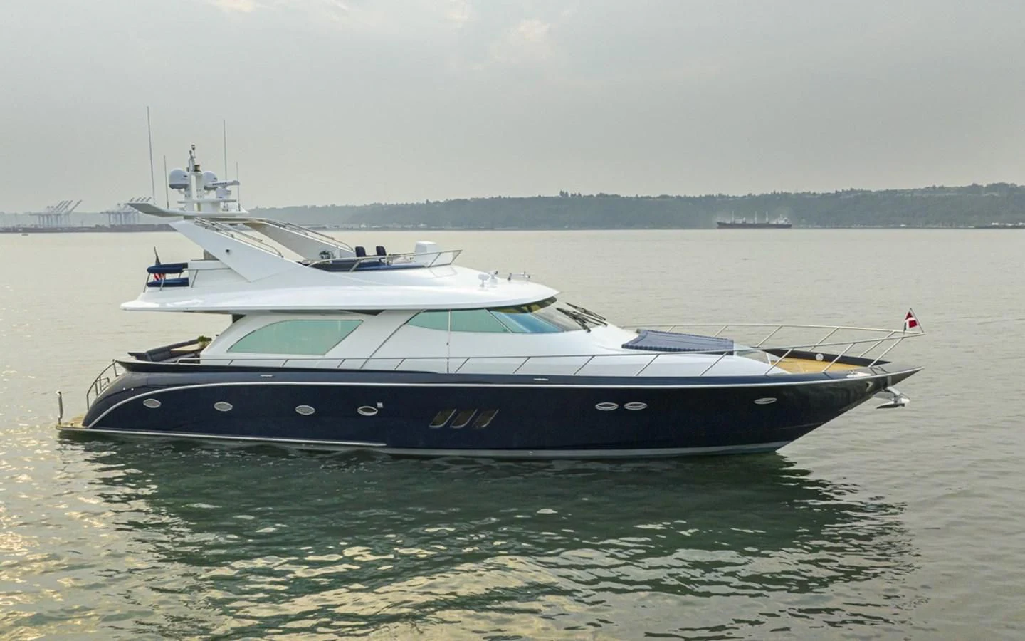 a boat on the water aboard UNDAUNTED Yacht for Sale