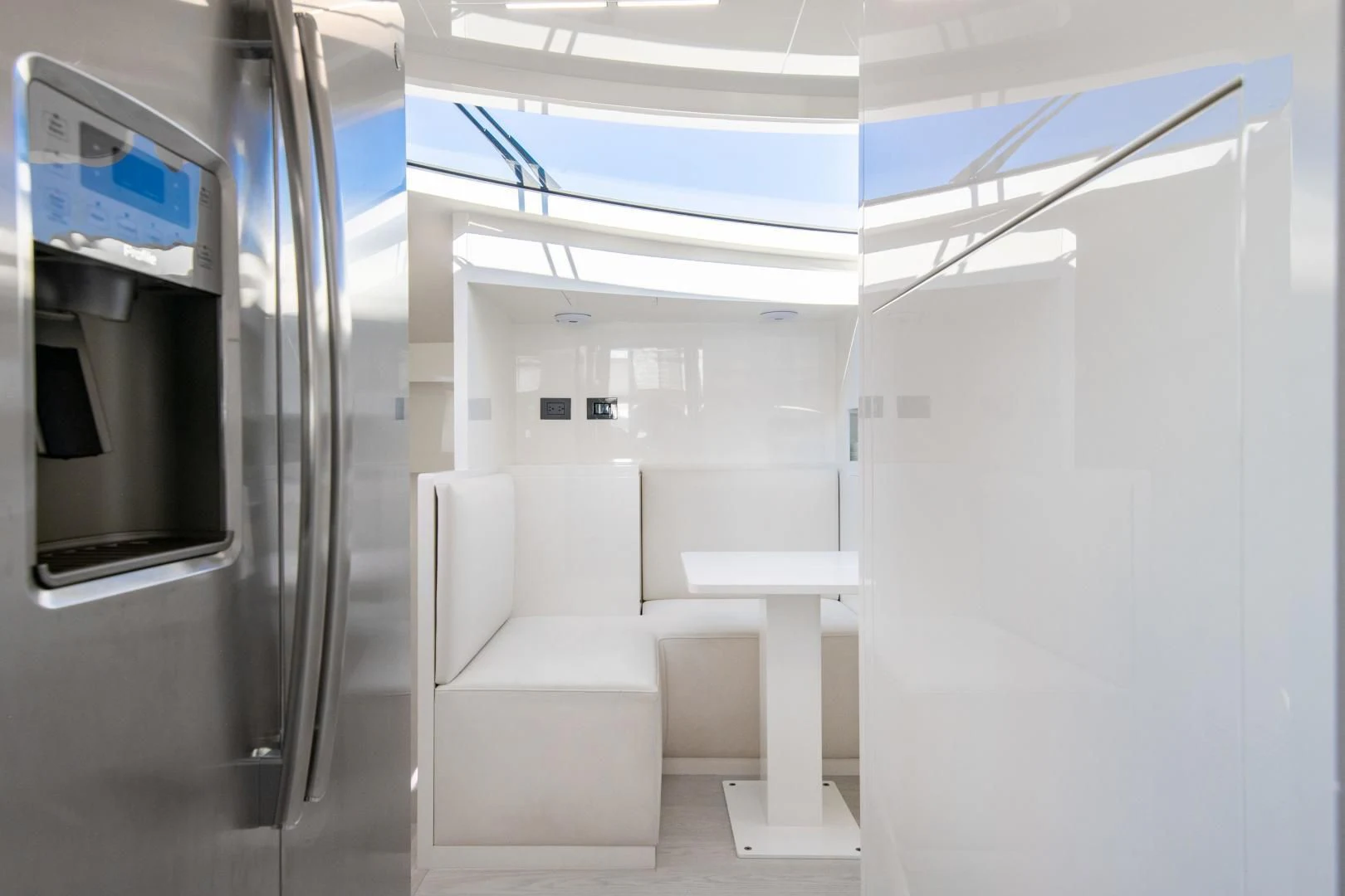 a room with a couch and a machine aboard ISLA MARIE Yacht for Sale