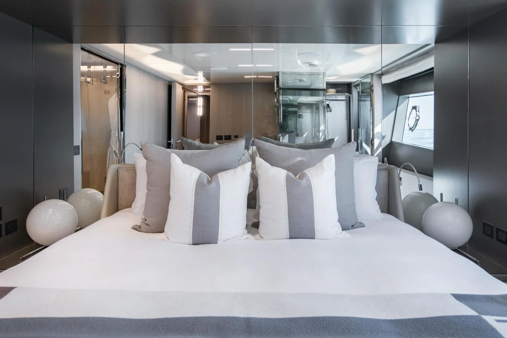 a bed with white sheets aboard ISLA MARIE Yacht for Sale