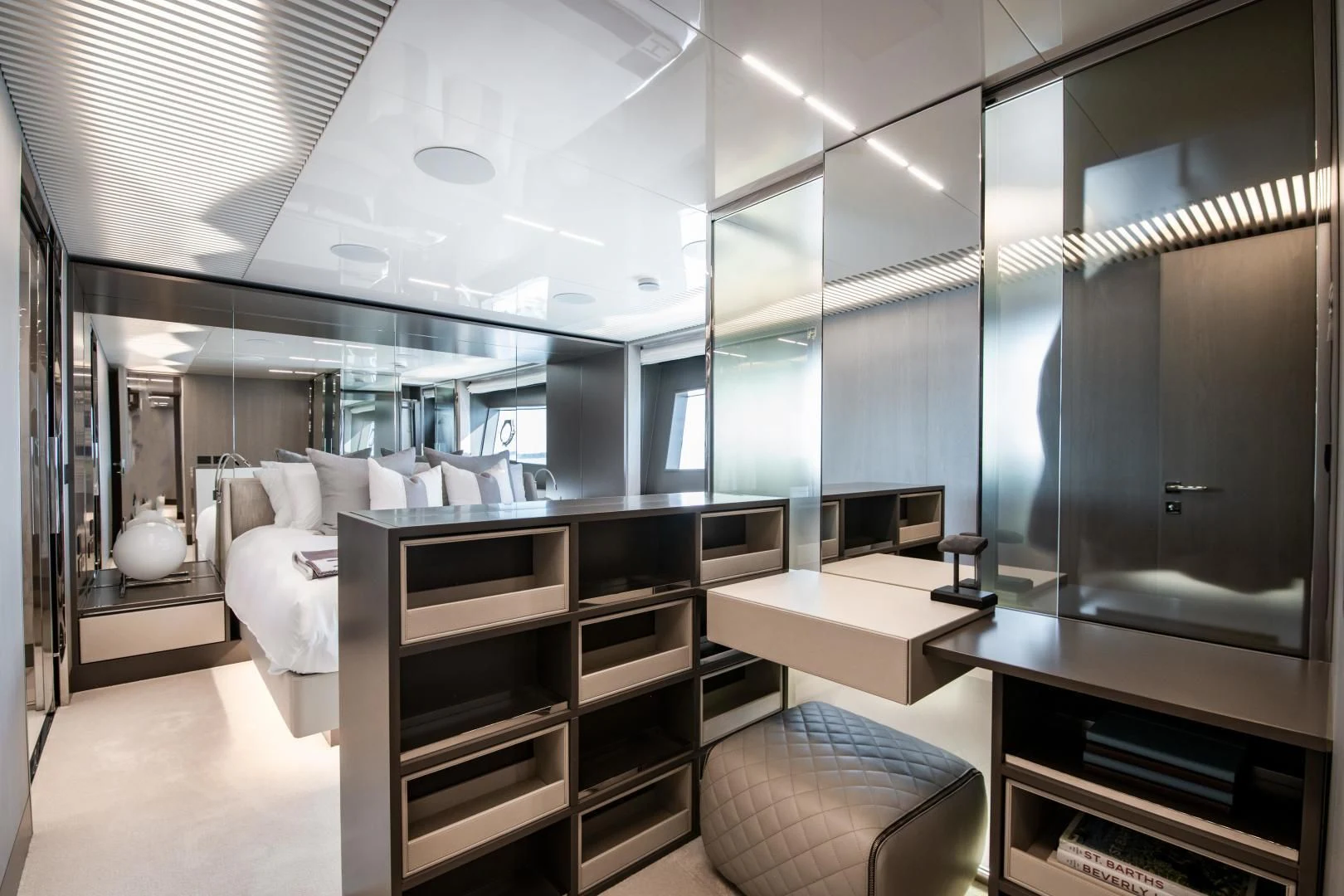 a room with a bed and a desk aboard ISLA MARIE Yacht for Sale