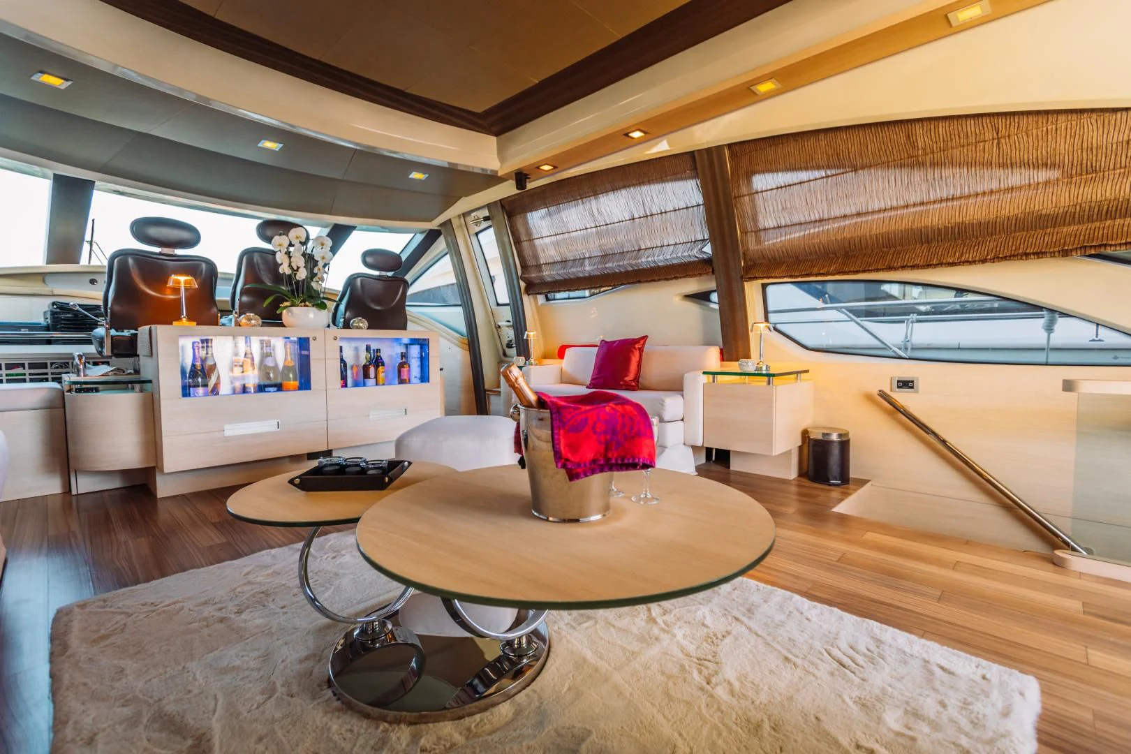 a room with a table and chairs aboard NAMI Yacht for Sale