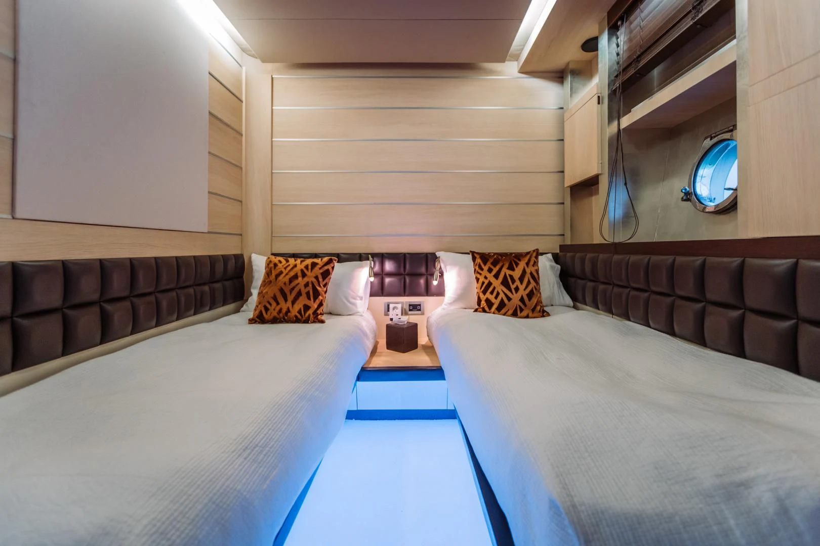 a room with two beds aboard NAMI Yacht for Sale