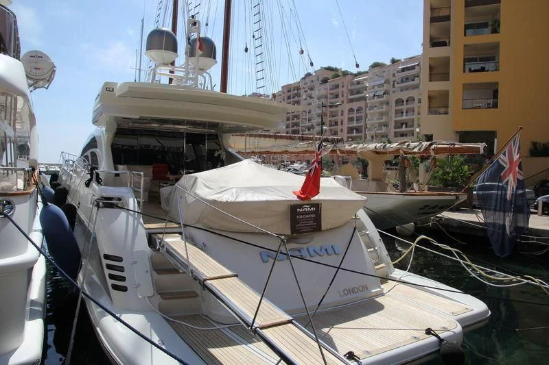 a boat docked in a harbor aboard NAMI Yacht for Sale