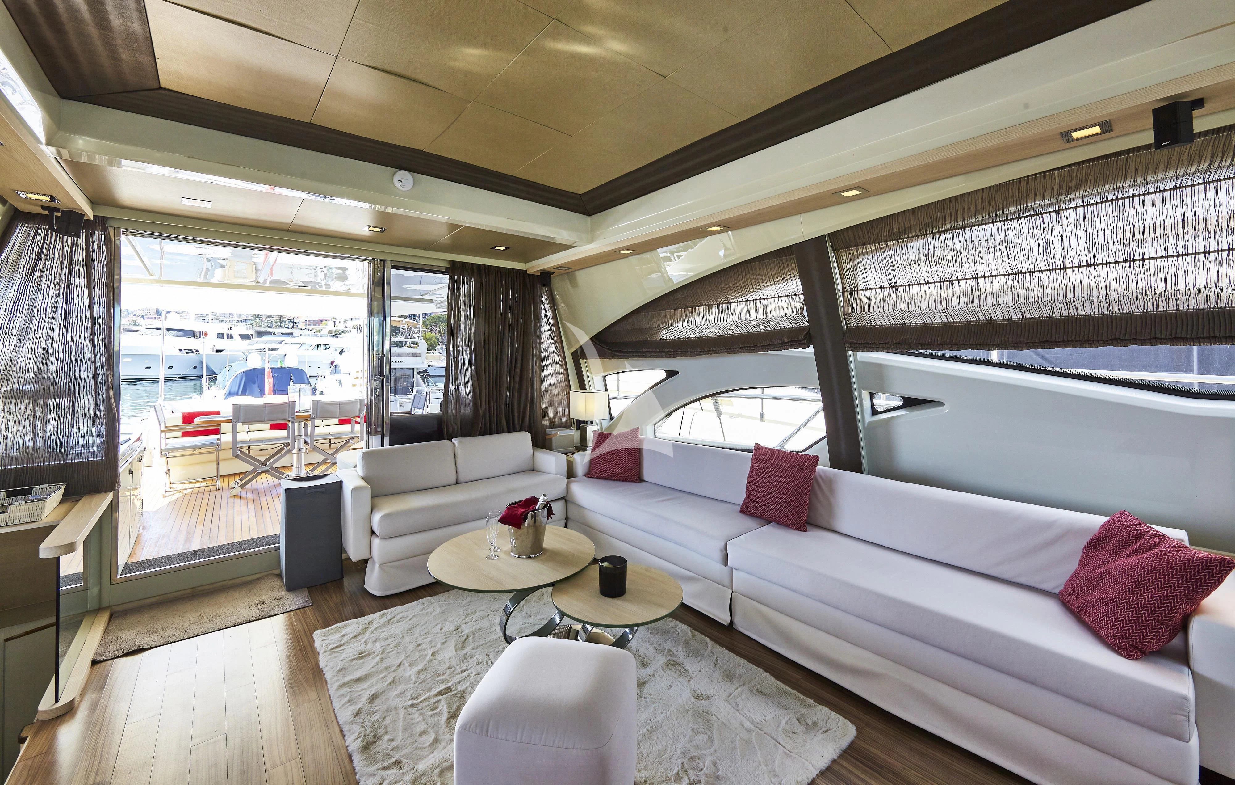 a living room with a large window aboard NAMI Yacht for Sale