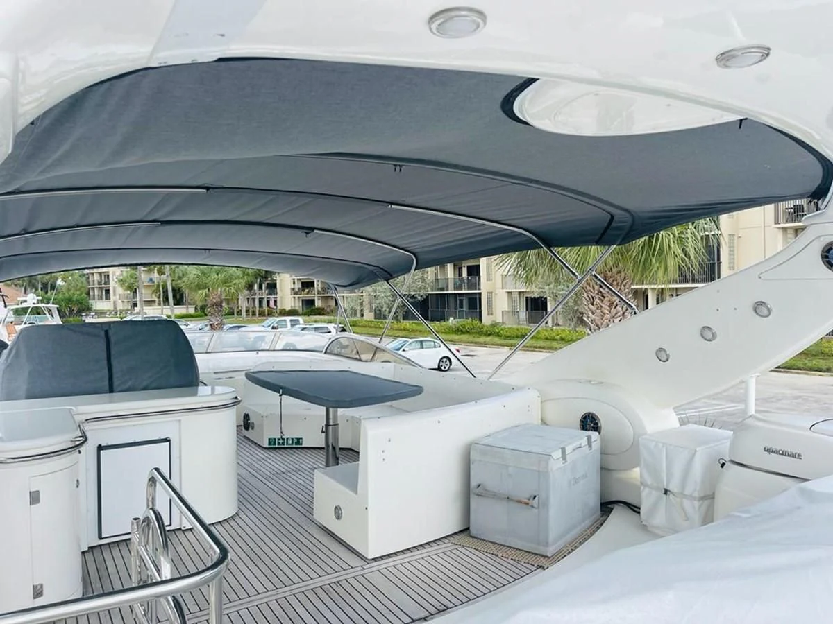 a white tent with a solar panel aboard LADY ESTHER Yacht for Sale