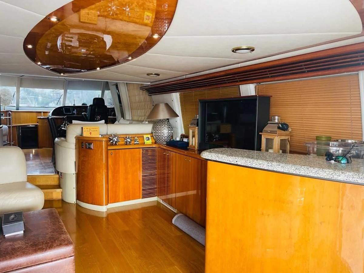 a kitchen with a large ceiling fan aboard LADY ESTHER Yacht for Sale