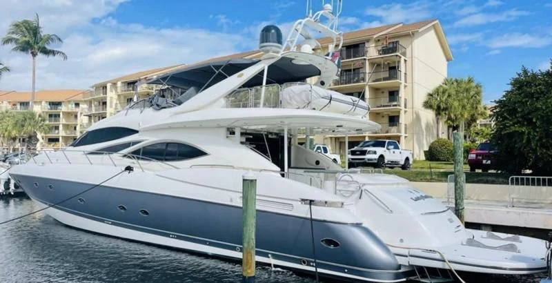 a white yacht docked aboard LADY ESTHER Yacht for Sale