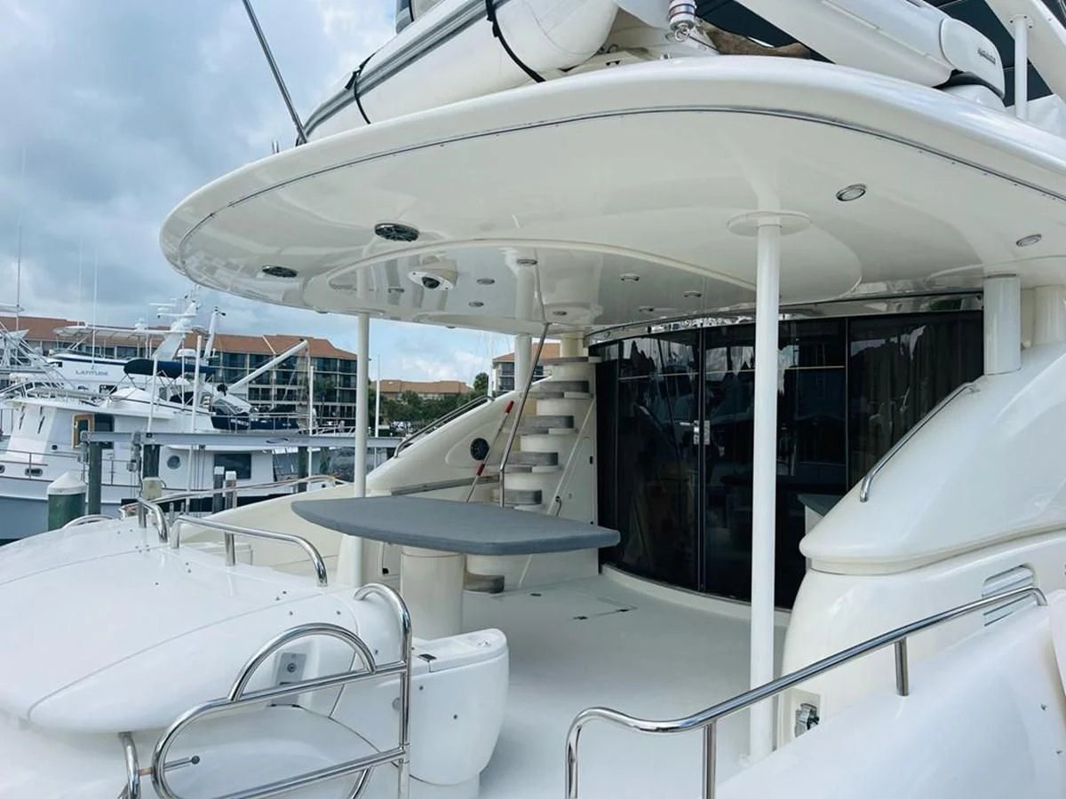 a boat with a white canopy aboard LADY ESTHER Yacht for Sale