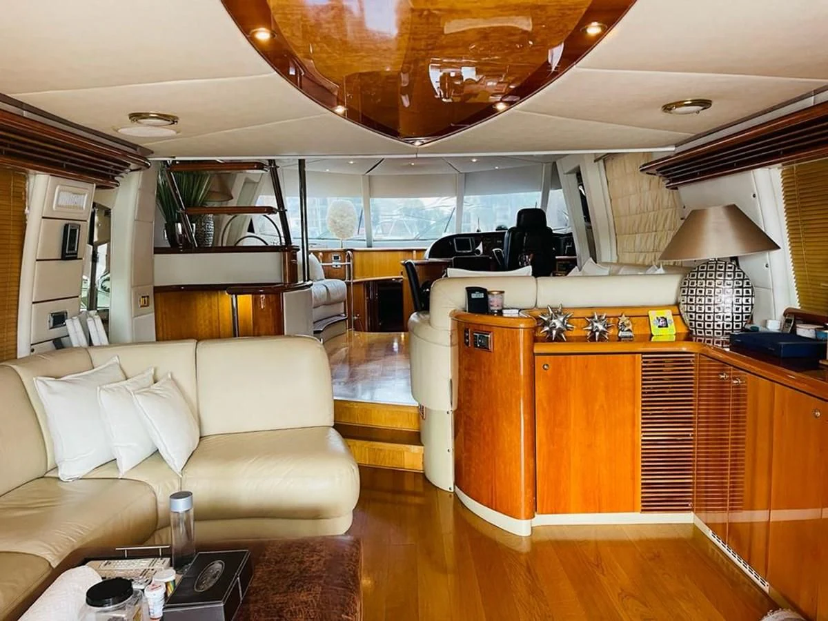 a living room with a large open window aboard LADY ESTHER Yacht for Sale