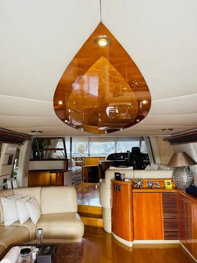 a room with a large ceiling fan aboard LADY ESTHER Yacht for Sale