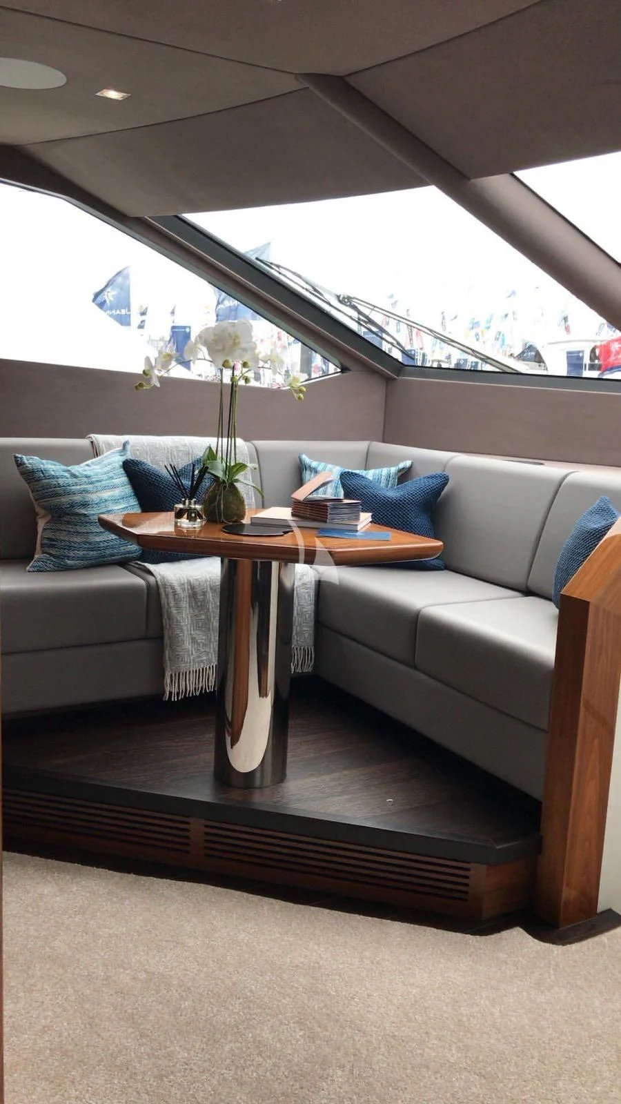 a couch with a coffee table aboard BLUE INFINITY Yacht for Sale