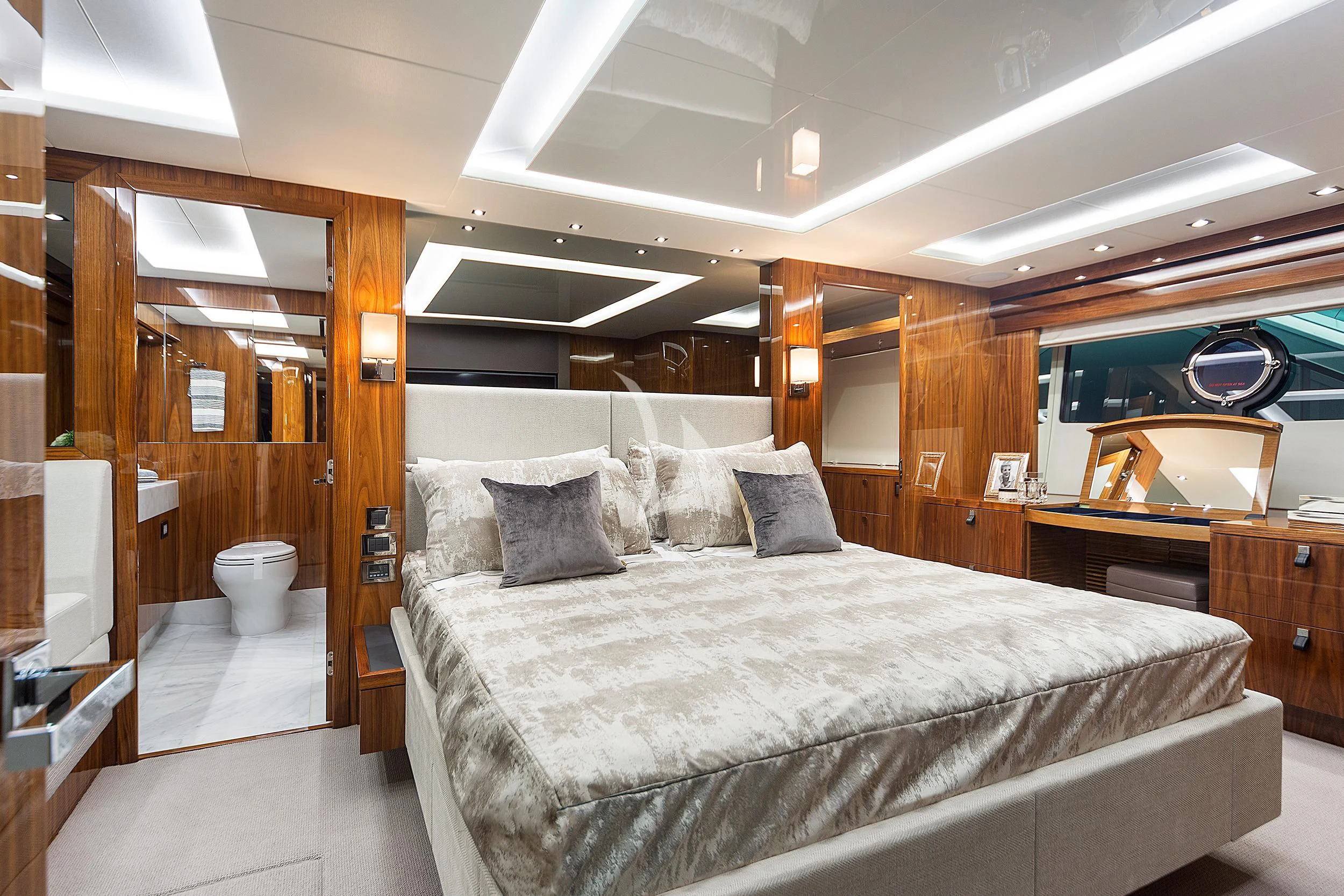 a large bed in a room aboard BLUE INFINITY Yacht for Sale