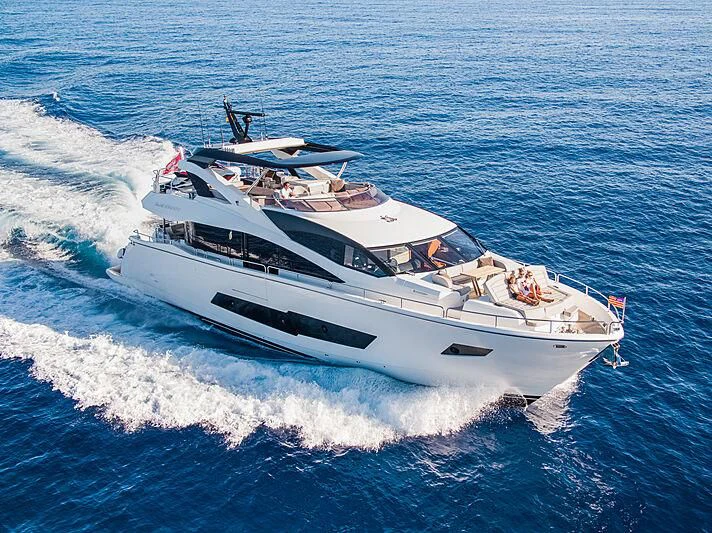 a white boat on the water aboard BLUE INFINITY Yacht for Sale