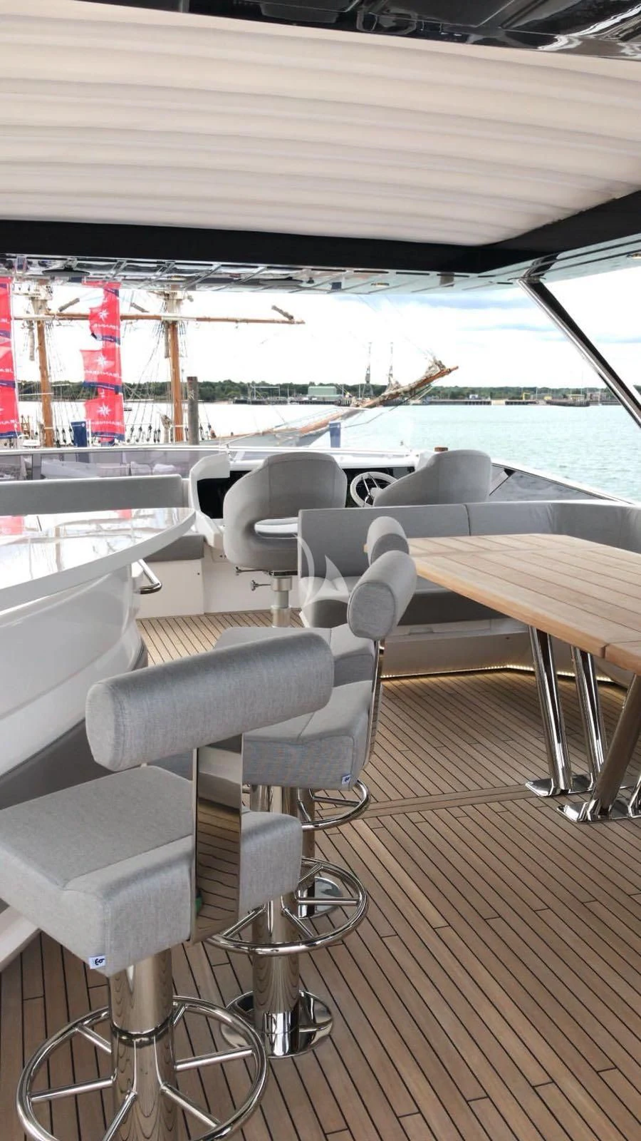 a chair on a deck aboard BLUE INFINITY Yacht for Sale
