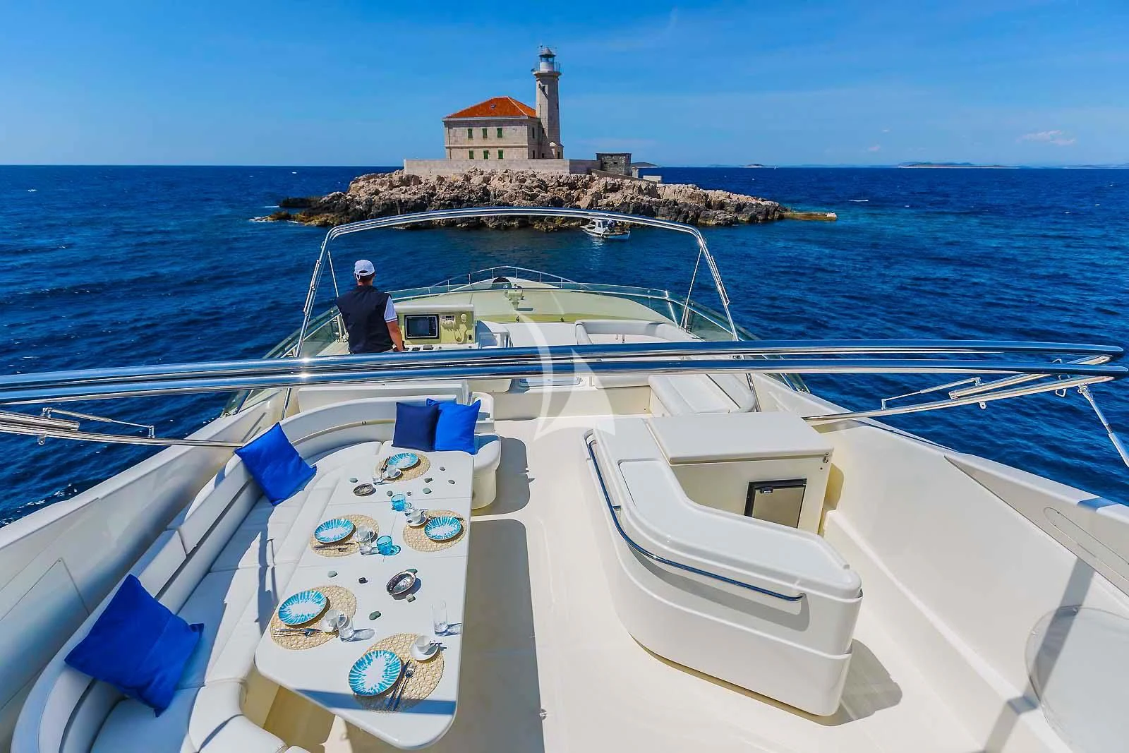 a boat with a couple of people on it aboard MISS KATARIINA Yacht for Sale
