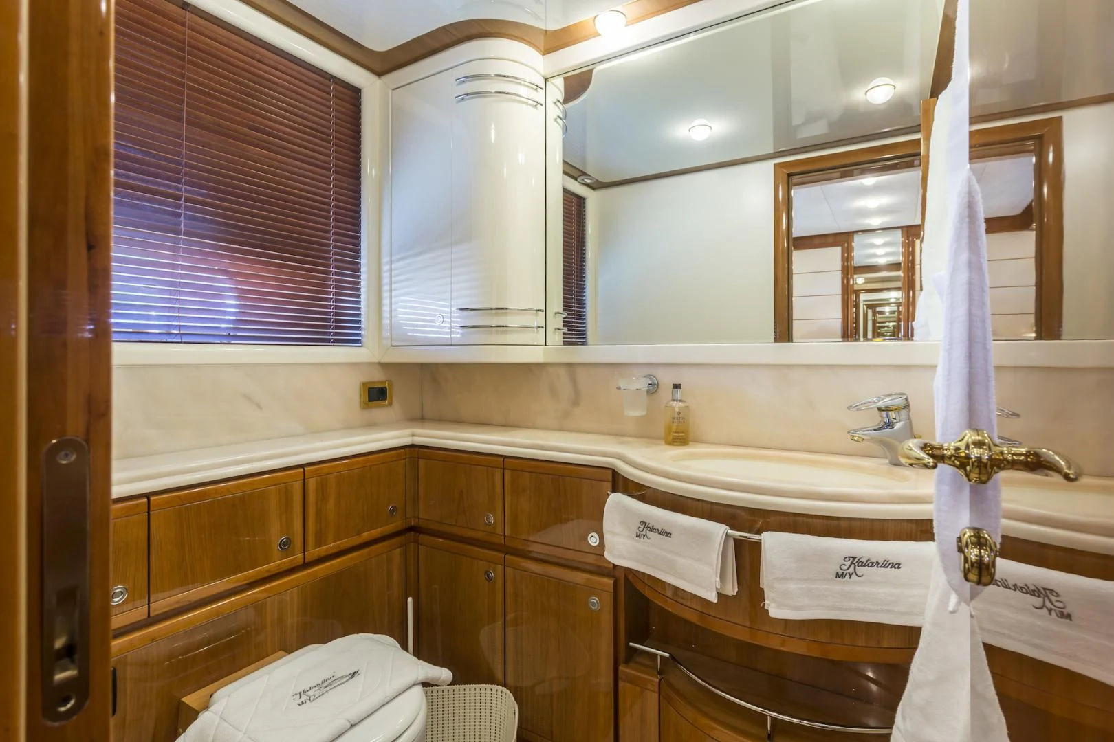 a bathroom with a sink and a shower aboard MISS KATARIINA Yacht for Sale