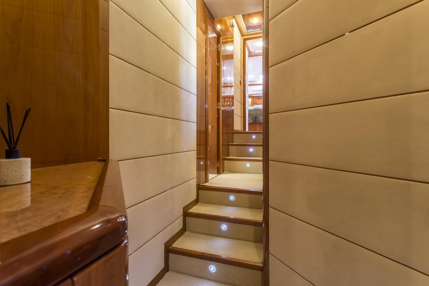 a wooden staircase in a room aboard MISS KATARIINA Yacht for Sale