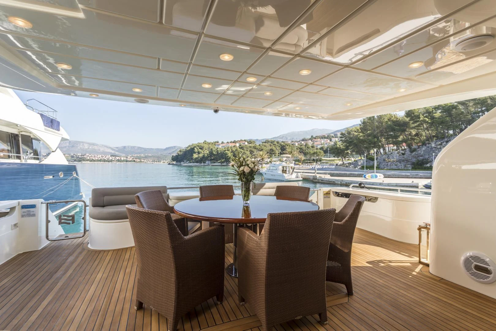 a table and chairs on a deck aboard MISS KATARIINA Yacht for Sale