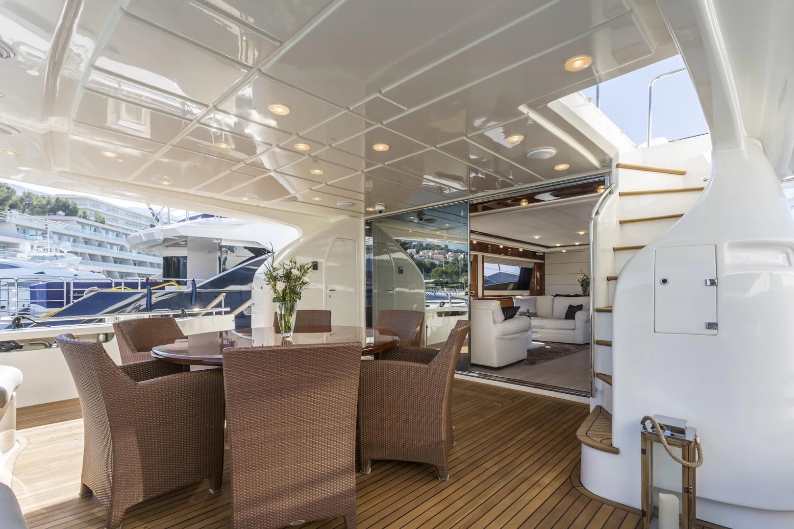 a room with a table chairs and a television aboard MISS KATARIINA Yacht for Sale