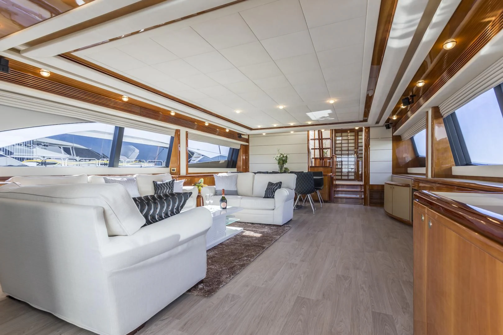 a living room with a large open window aboard MISS KATARIINA Yacht for Sale