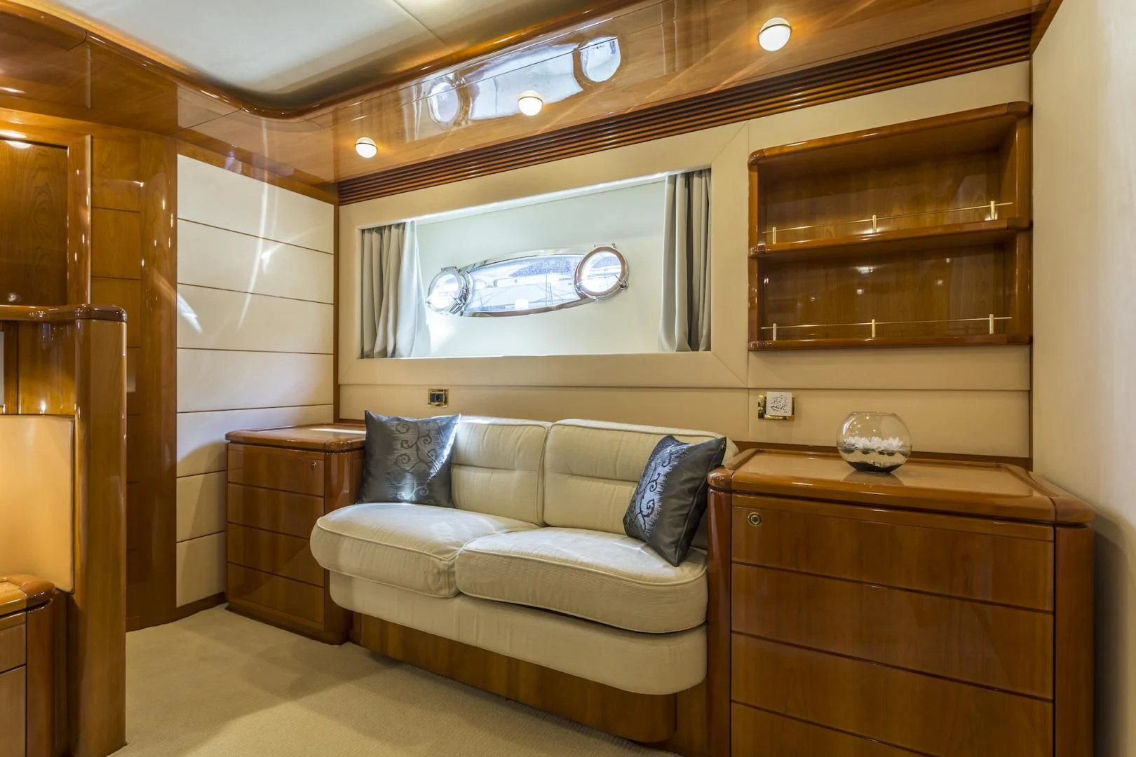 a living room with a couch and a television aboard MISS KATARIINA Yacht for Sale