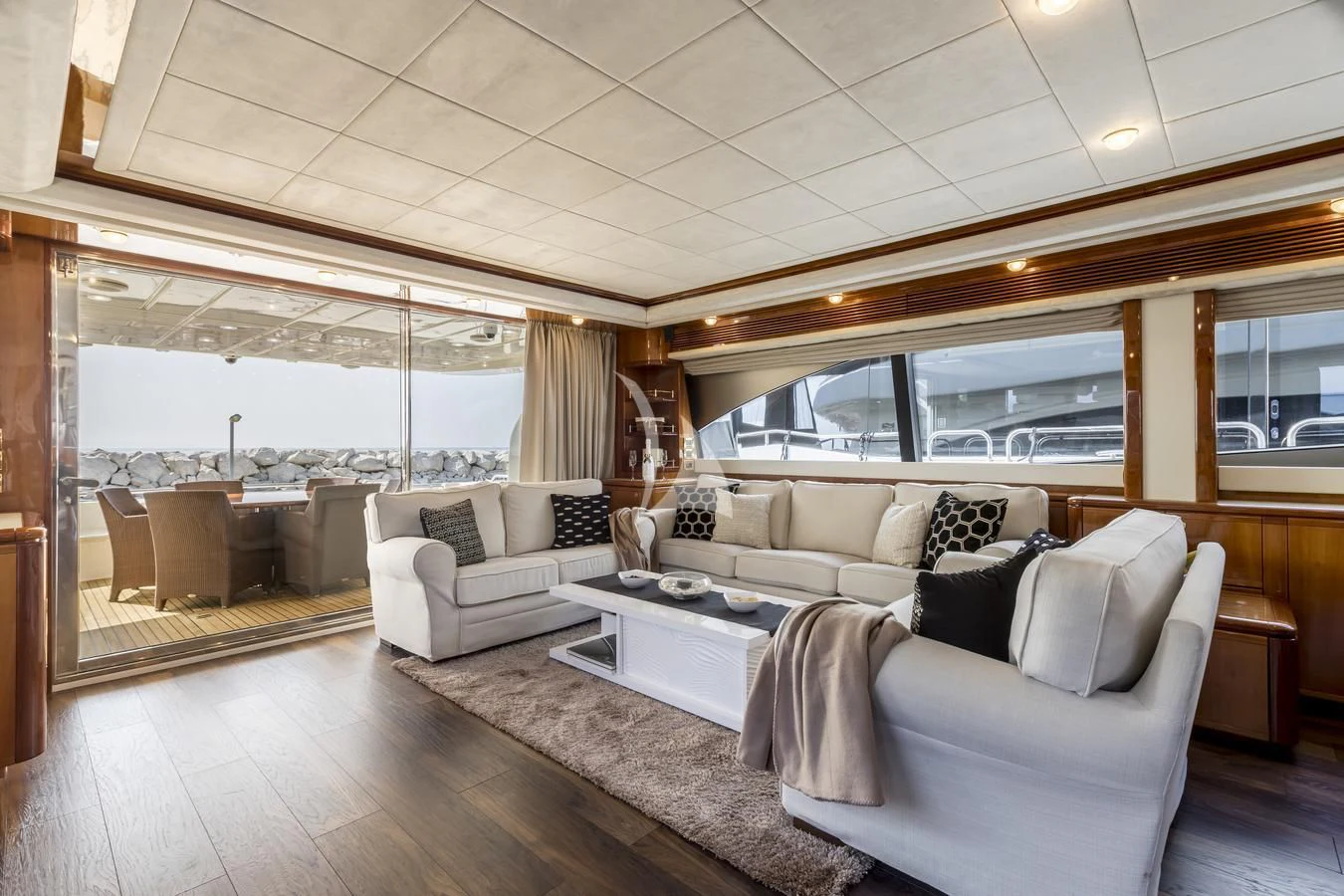 a living room with a large window aboard MISS KATARIINA Yacht for Sale