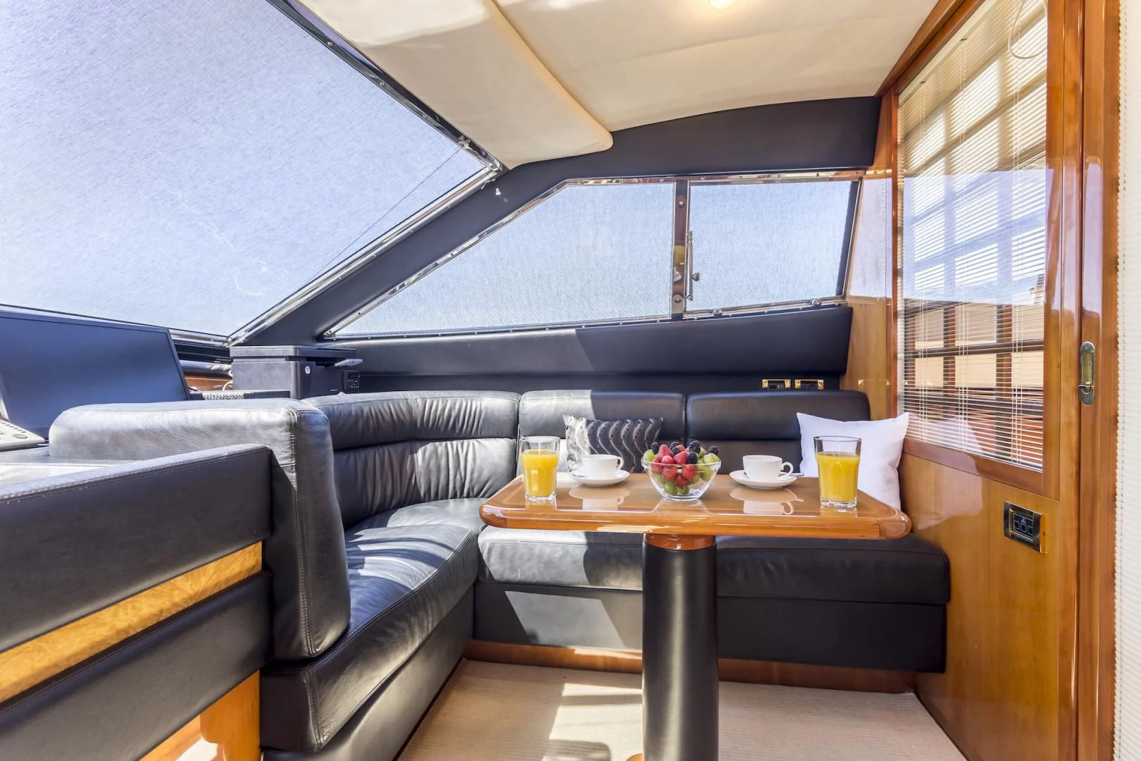 a room with a couch and a table aboard MISS KATARIINA Yacht for Sale