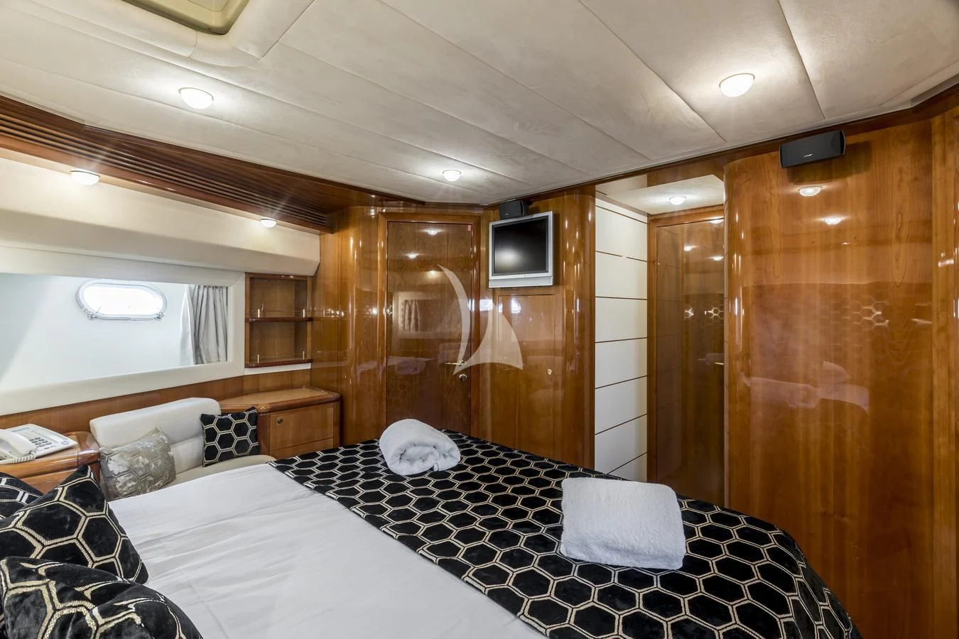 a large bedroom with a bed aboard MISS KATARIINA Yacht for Sale