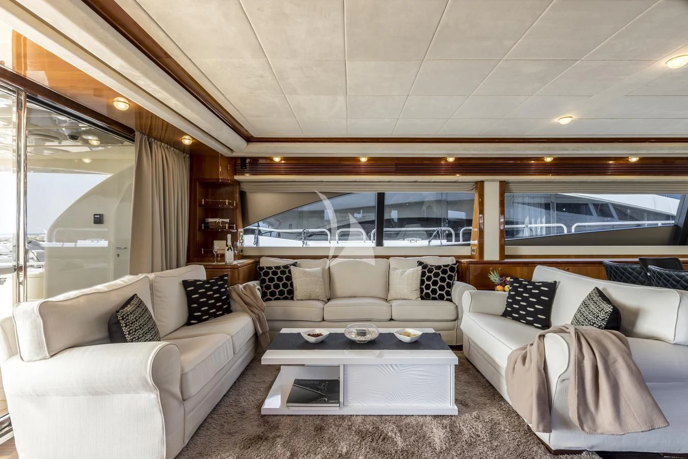 a living room with a large window aboard MISS KATARIINA Yacht for Sale