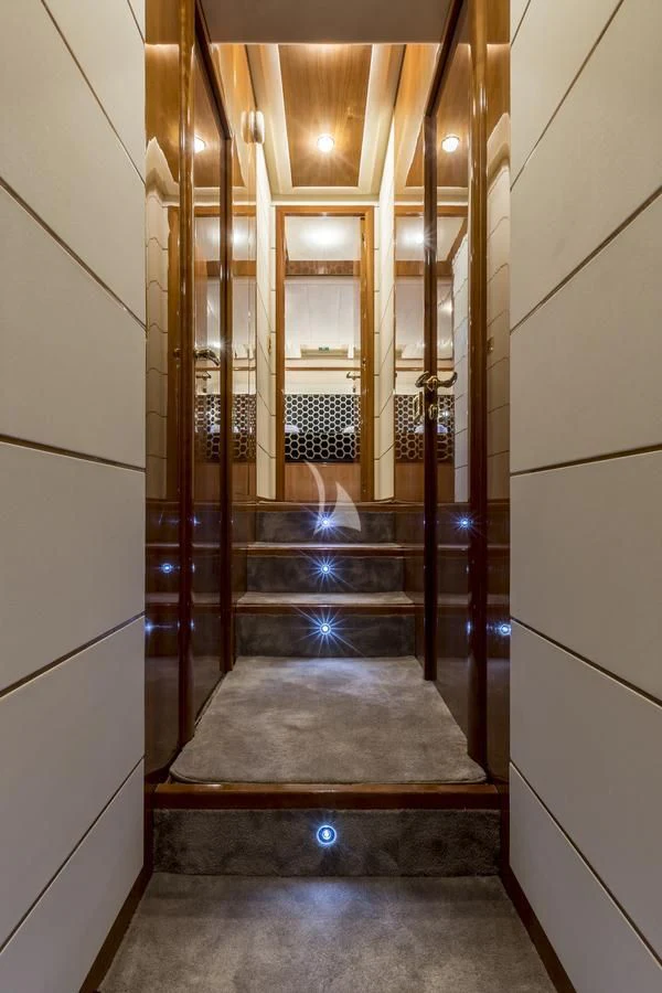 a wooden staircase in a building aboard MISS KATARIINA Yacht for Sale