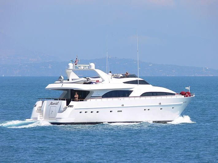 a white boat on the water aboard MARIEL Yacht for Sale