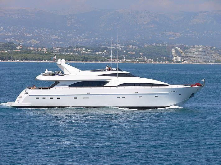 a white yacht in the water aboard MARIEL Yacht for Sale