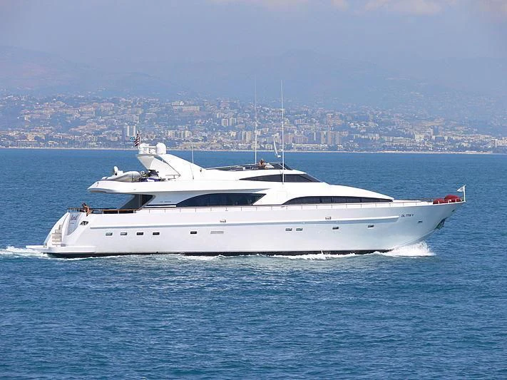 a white yacht in the water aboard MARIEL Yacht for Sale
