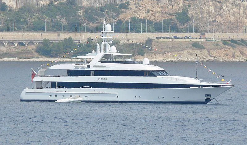 a white yacht in the water aboard KISSES Yacht for Sale