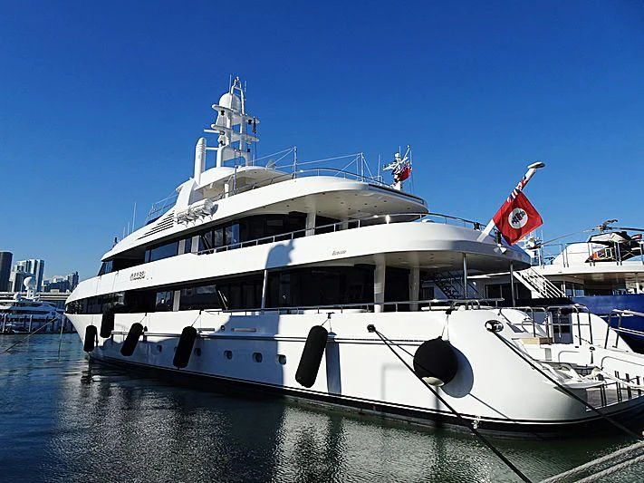 a large white boat in the water aboard KISSES Yacht for Sale