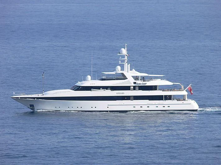 a white yacht in the water aboard KISSES Yacht for Sale