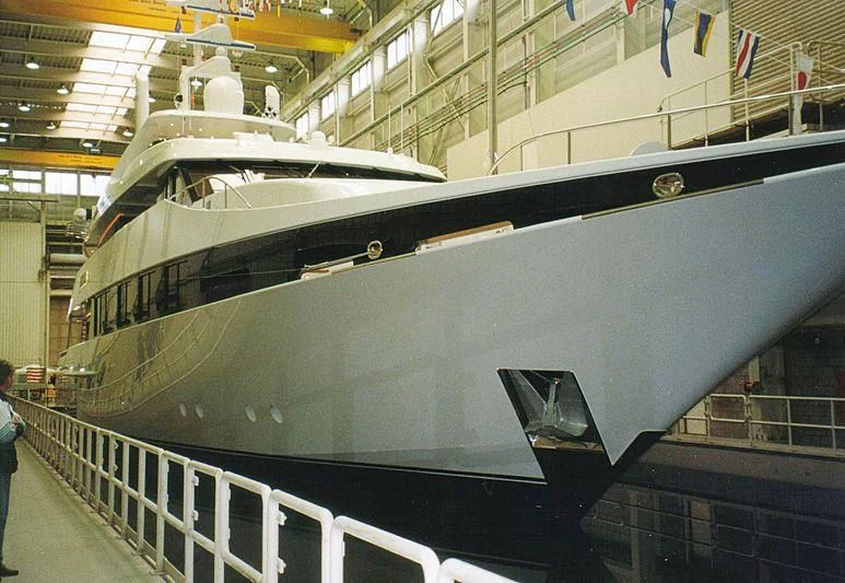 a silver train inside a building aboard KISSES Yacht for Sale