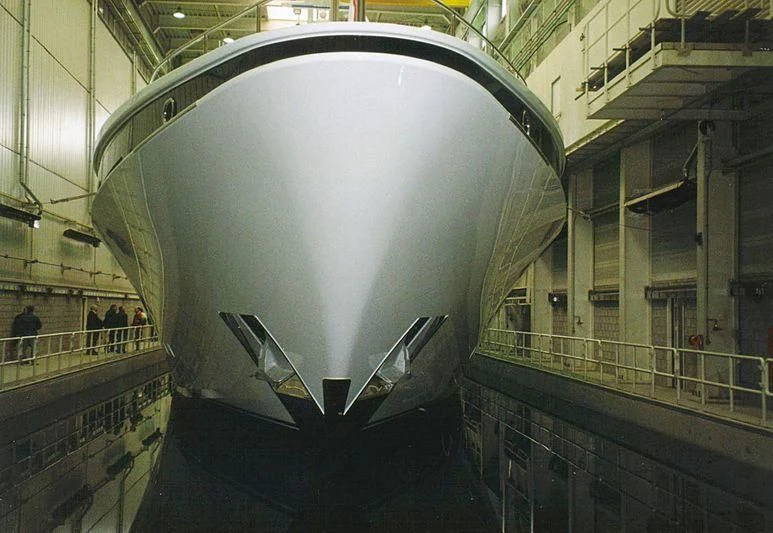 a large round metal object in a building aboard KISSES Yacht for Sale