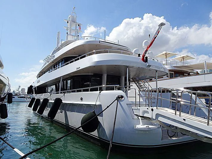 a boat docked at a pier aboard KISSES Yacht for Sale