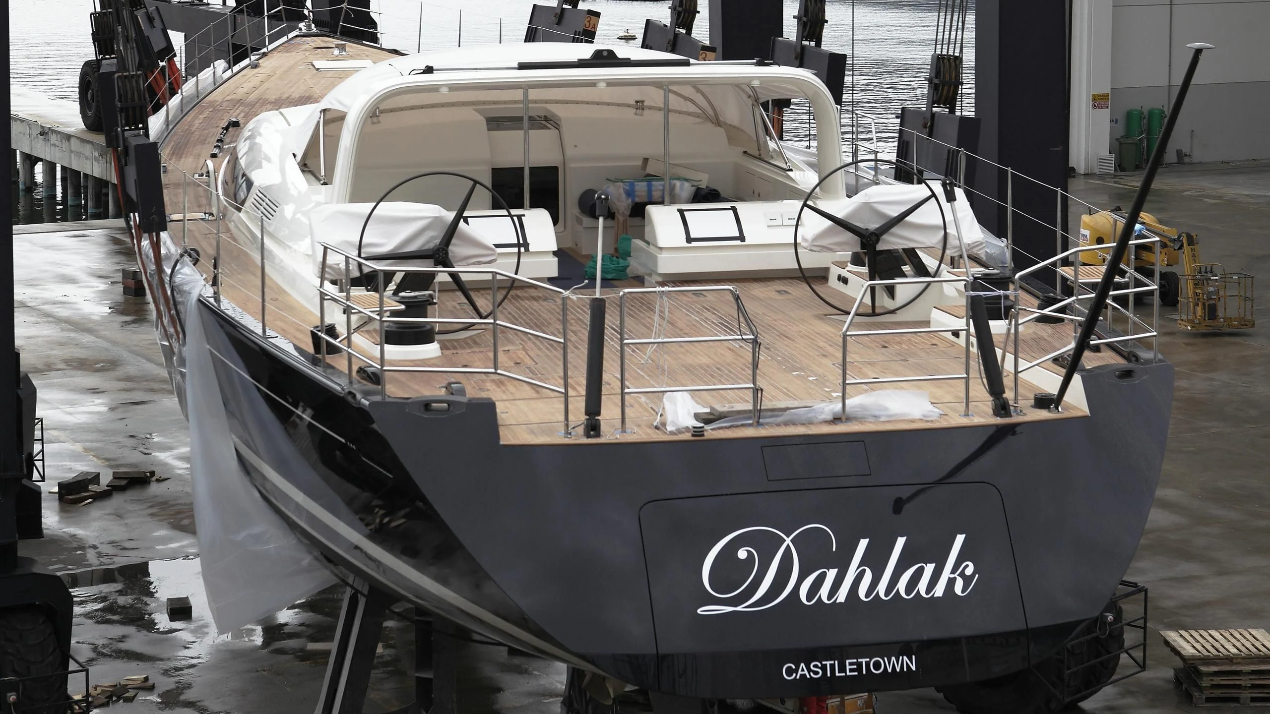 a boat on a dock aboard DAHLAK Yacht for Sale