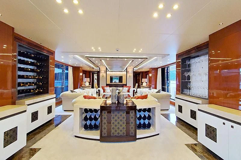 a room with a table and chairs aboard THE DOGS Yacht for Sale