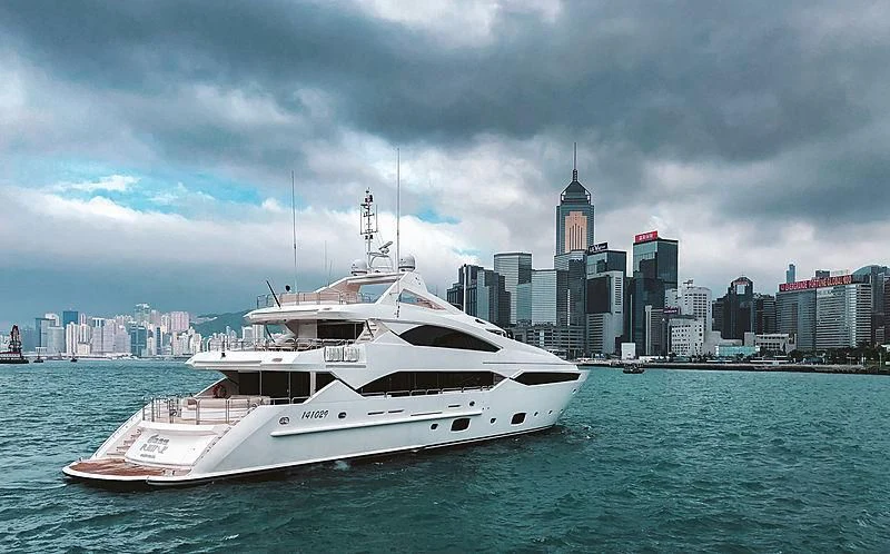 a large white boat in the water aboard THE DOGS Yacht for Sale