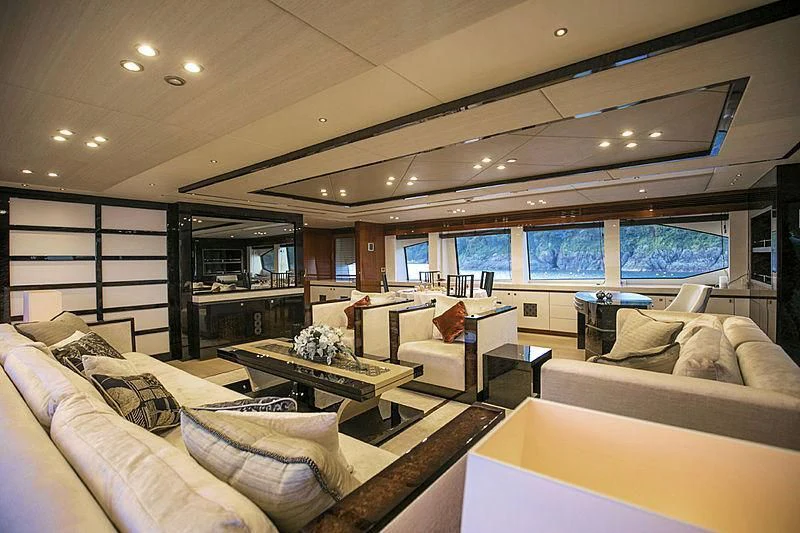 a living room with a large window aboard THE DOGS Yacht for Sale