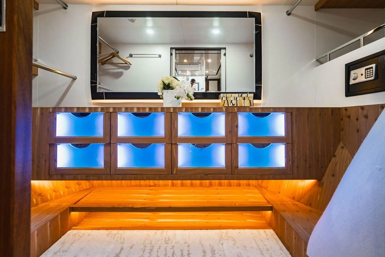 a room with a mirror and flowers aboard FAR NIENTE Yacht for Sale