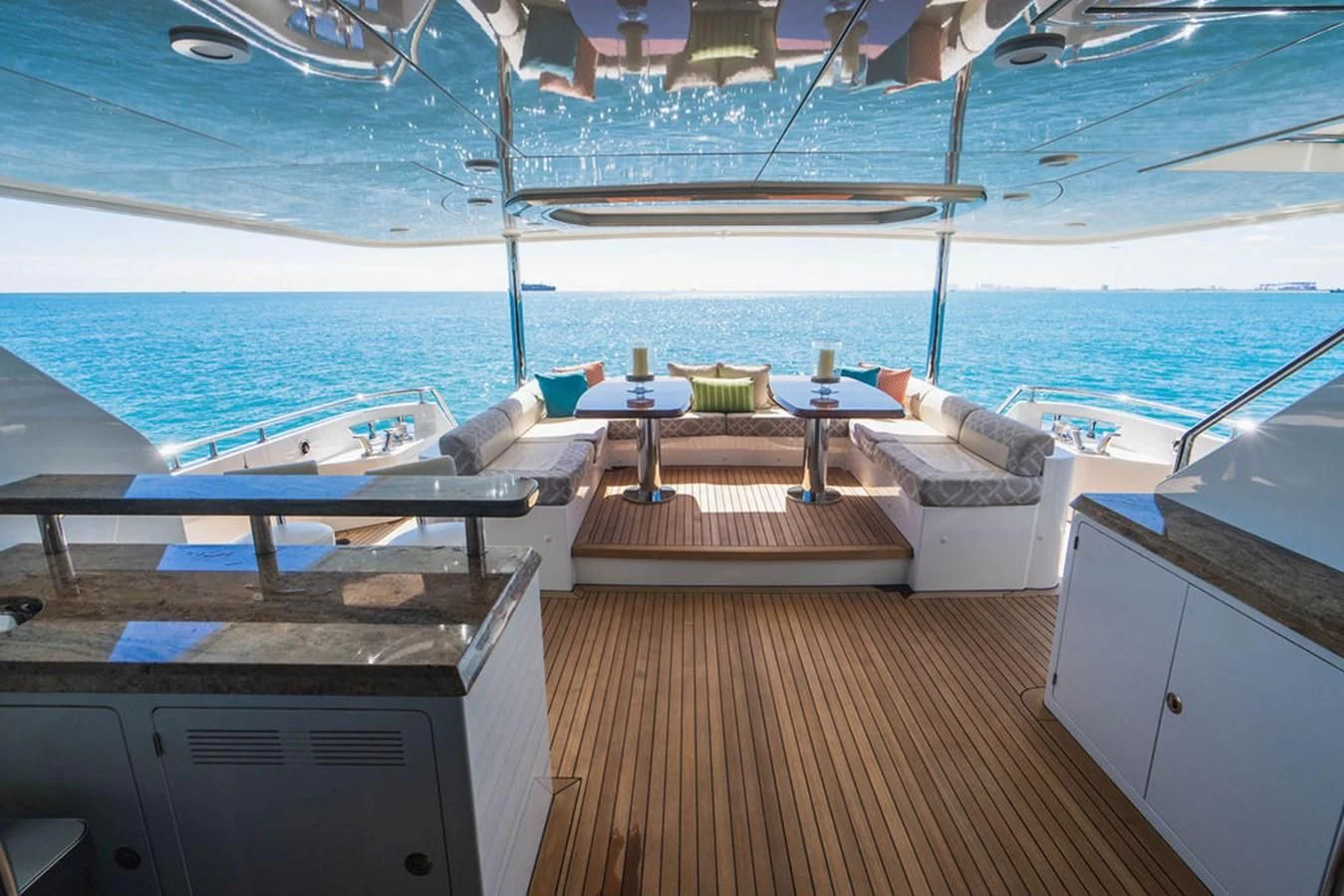 a deck with a view of the ocean and the deck aboard FAR NIENTE Yacht for Sale